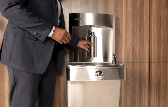 Filling Water Bottle at Drinking Fountain with Bottle Filler
