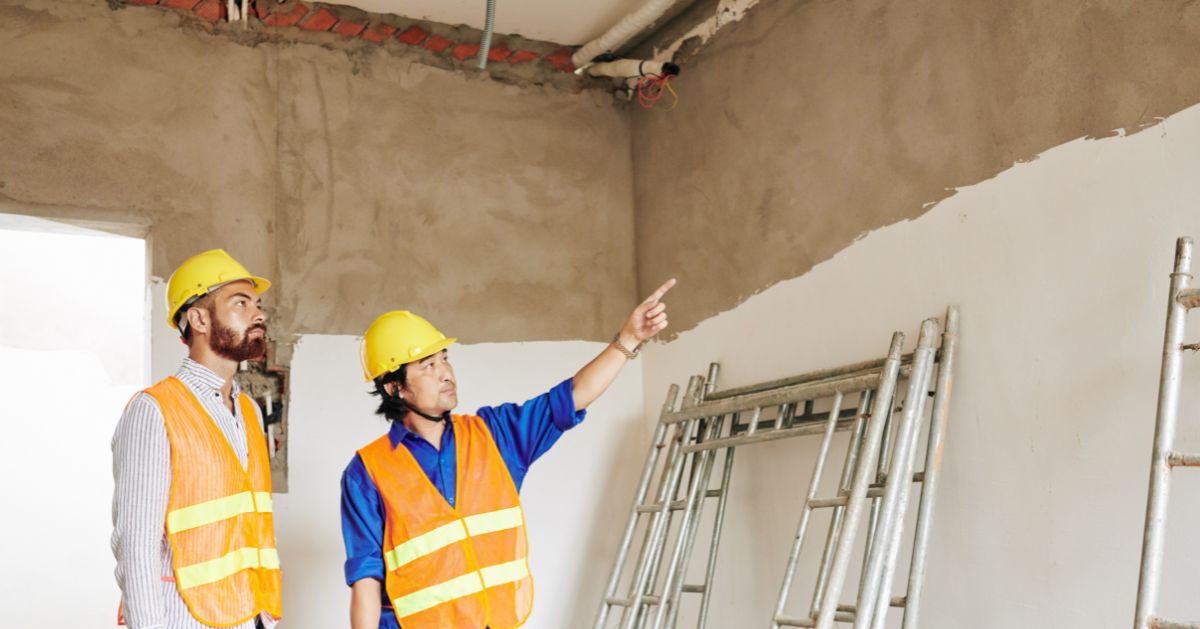 contractors frustrated over water damage to interior of commercial building