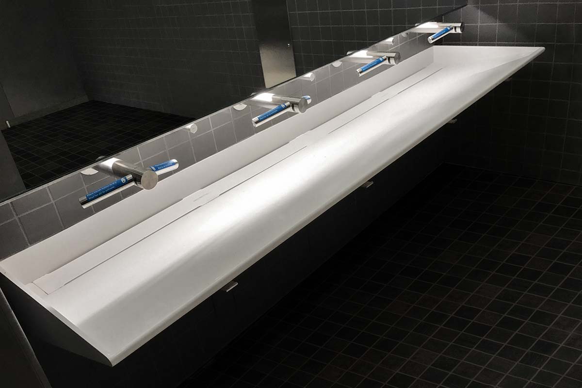 Combination faucet and hand dryer